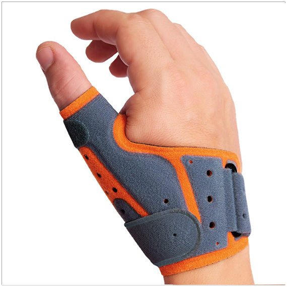A hand wearing the Fix Comfort Thumb Brace, a firm support brace that stabilizes the thumb from the wrist to the tip joint to relieve pain from thumb arthritis, skier’s thumb, gamekeeper’s thumb, and overuse injuries.