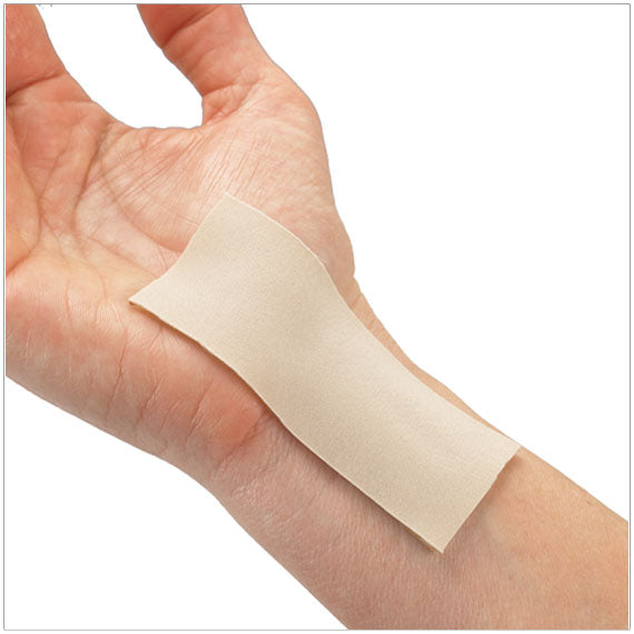 Gel Mate Medical-grade silicone gel sheet shown on a hand & wrist, applying gentle compression and hydration to scars to promote softer, flatter healing