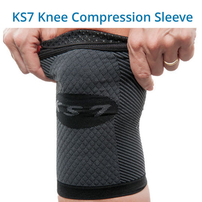 A person is shown wearing a black KS7 Knee Compression Sleeve, which is designed to fit the knee and provide support with its compression features.
