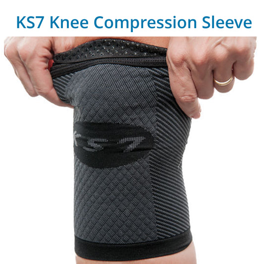 A person is shown wearing a black KS7 Knee Compression Sleeve, which is designed to fit the knee and provide support with its compression features.