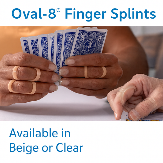 Beige and clear Oval-8 Finger Splints worn on a person’s fingers while playing cards, supporting alignment, relieving pain, and aiding mobility for arthritis and other finger conditions