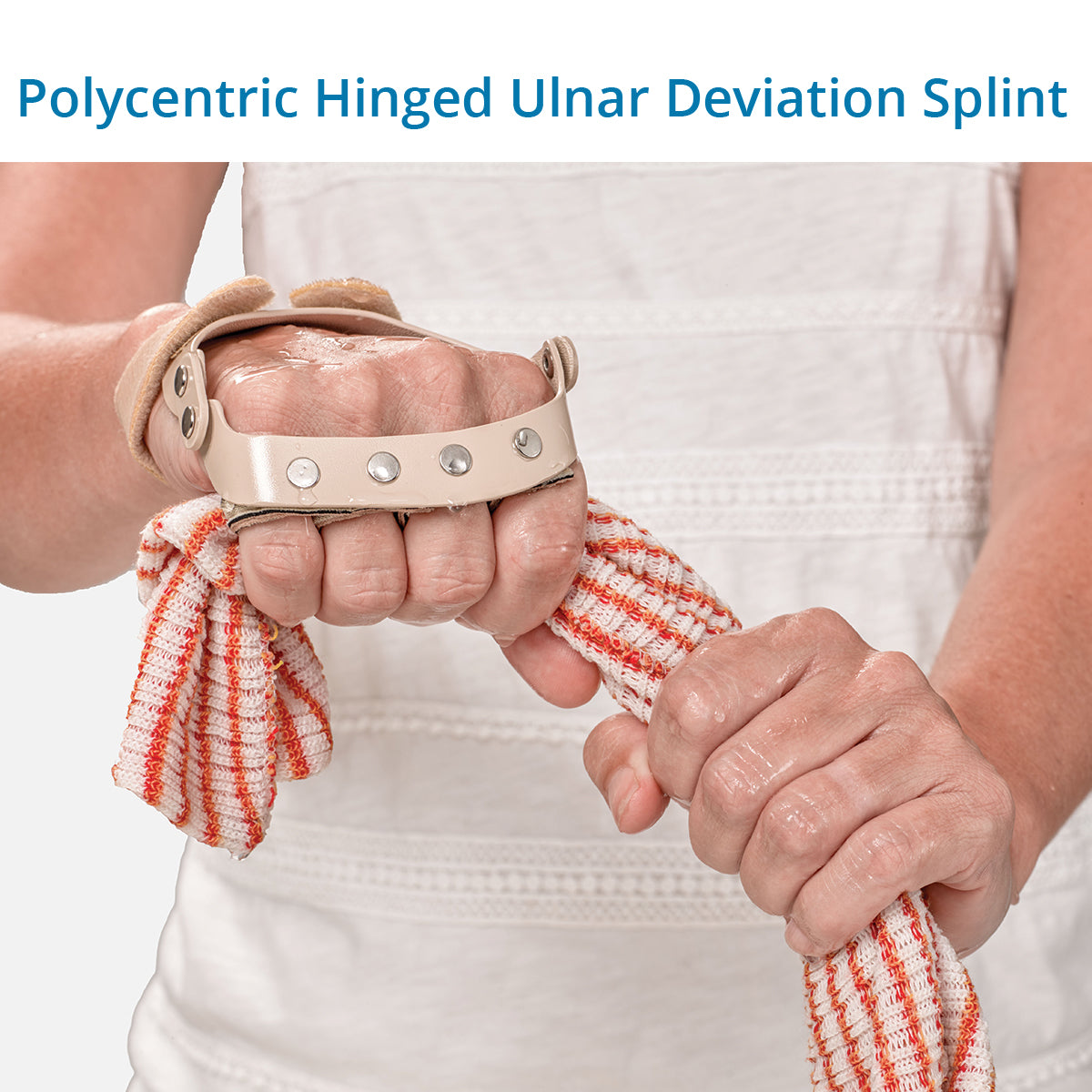 A person is wearing a Polycentric Hinged Ulnar Deviation Splint on their hand, which is designed to straighten the fingers and improve hand function.