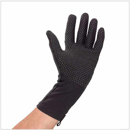 A hand wearing a black Protexgloves Grip glove. The glove helps manage mild swelling, protects sensitive skin, and improves grip strength with its textured surface.