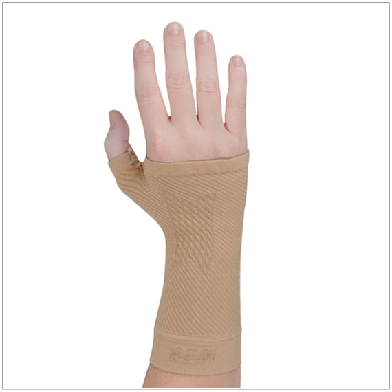 WS6 Wrist Compression Sleeve shown in tan on hand and wrist provides wrist relief and support for carpal tunnel syndrome, wrist pain/strain, arthritis, tendinitis, or deQuervain's Tenosynovitis