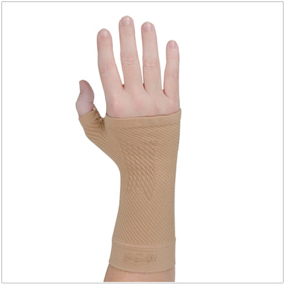 WS6 Wrist Compression Sleeve shown in tan on hand and wrist provides wrist relief and support for carpal tunnel syndrome, wrist pain/strain, arthritis, tendinitis, or deQuervain's Tenosynovitis