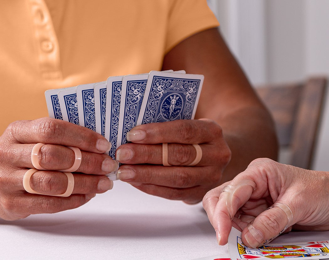 The original oval-8 finger splints in clear & beige. Shown on multiple fingers. Multi Size Sets with 3 or 5 consecutive size splints provide a mix of sizes to assure a proper fit  when you need to where on multiple fingers